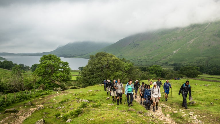 A group of fell walkers on a summer hike at Wasdale Head, Cumbria